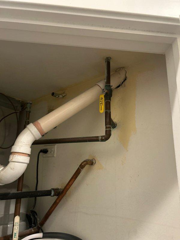 Diagnosed low water pressure issue in shower caused by deteriorated hot water valve. Accessed plumbing through wall panel, removed and replaced faulty pressure-balancing valve in shower mixer assembly. Tested system after installation, confirming restored water pressure at all temperature settings.