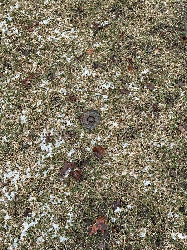 Conducted assessment for lead service line replacement as requested. Inspected exterior access point (metal utility cover) and interior water meter installation. Evaluation completed of existing piping system showing aged copper/brass components with visible tarnishing, requiring priority replacement of lead supply line.