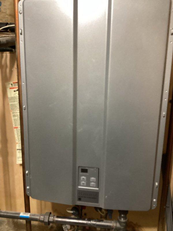 Performed scheduled maintenance on wall-mounted tankless water heater as requested by VIP client. Completed comprehensive system flush to remove mineral buildup and ensure optimal performance. Documented service with photos and applied updated service label to unit.