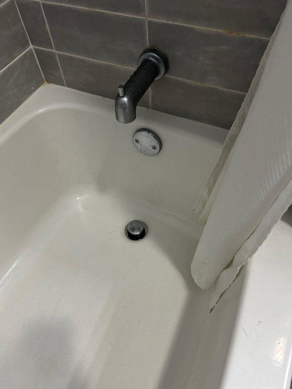 Responded to service call for bathroom plumbing issue where water was backing up into both tub and sink in the same bathroom. Upon inspection, discovered clogged drain line affecting multiple fixtures. Successfully cleared obstruction using professional-grade equipment, restoring proper drainage to all affected fixtures and verifying complete water flow.