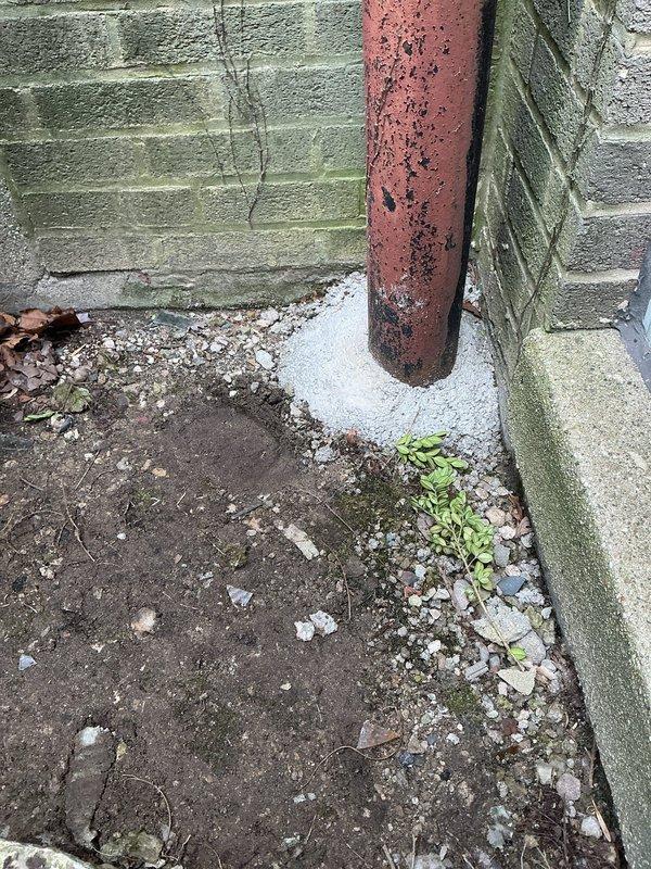 Performed camera inspection of aging downspout system. Identified significant pipe deterioration with visible corrosion and mineral buildup along interior walls. Camera revealed potential obstruction at far end of pipe, likely sediment or debris accumulation, which may be restricting proper drainage.