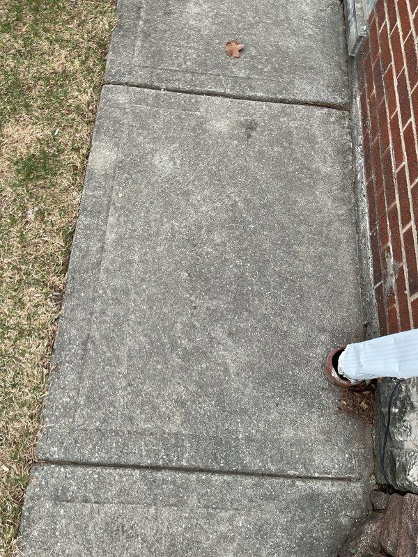 Responded to emergency call for basement flooding during heavy rain. Inspected exterior drainage system, including downspout connection and access point. Determined that washing machine drainage was backing up into basement drain due to clogged main line; cleared obstruction and verified proper system function before anticipated rainfall.