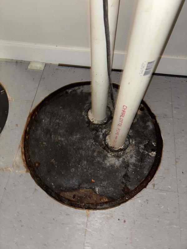 Replaced failed sump pump and ejector pump in basement area experiencing significant water accumulation at bottom of stairwell. Installed new PVC discharge piping with proper connections to existing drain system. Provided consultation on flood control system options to address recurring drainage issues.