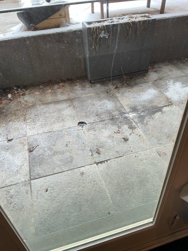 Responded to service call for basement bathroom drainage issue where toilet flushing caused bathtub backup. Inspection revealed significant buildup and debris in the drain line. Successfully cleared the clog using professional drain cleaning equipment, restoring proper drainage function to both fixtures.