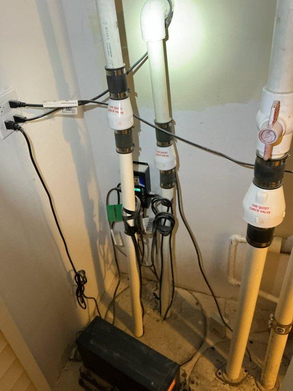 Performed maintenance on dual sump pump system, replacing non-functional backup batteries and verifying proper operation of check valves. Completed preventative maintenance on Navien tankless water heater, including inspection of water connections, venting system, and operational test of control panel functionality.