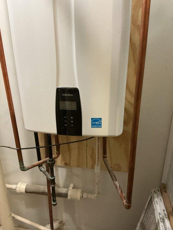 Performed maintenance on dual sump pump system, replacing non-functional backup batteries and verifying proper operation of check valves. Completed preventative maintenance on Navien tankless water heater, including inspection of water connections, venting system, and operational test of control panel functionality.