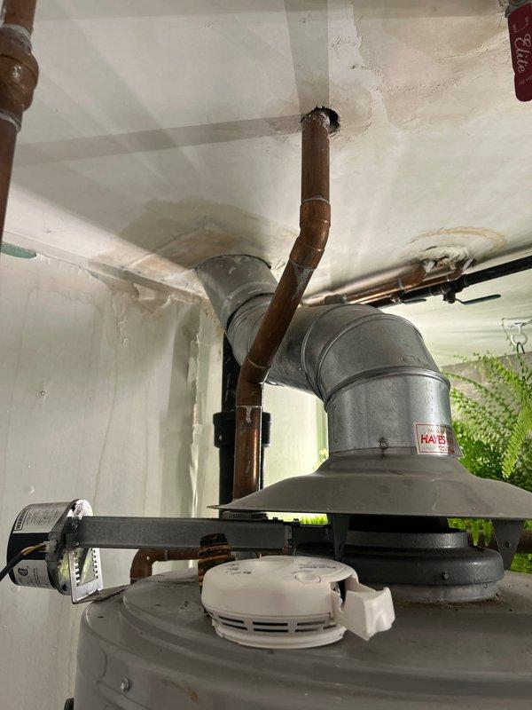Conducted inspection of a 100-gallon commercial water heater (2016 model) exhibiting multiple critical failures including pilot light ignition issues, leaking circulation pump, vent stuck in open position, and water leakage from tank bottom. Visual inspection confirmed water damage on ceiling near installation and compromised pipe penetrations. Provided comprehensive replacement estimate for the failing unit.