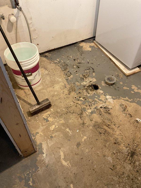 Responded to service request for recurring sewer backup in basement of 100-year-old home. Performed main line rodding to clear obstruction and conducted comprehensive video inspection of sewer system. Observed significant floor deterioration around basement drain and ongoing bathroom renovation work that may be contributing to drainage issues.