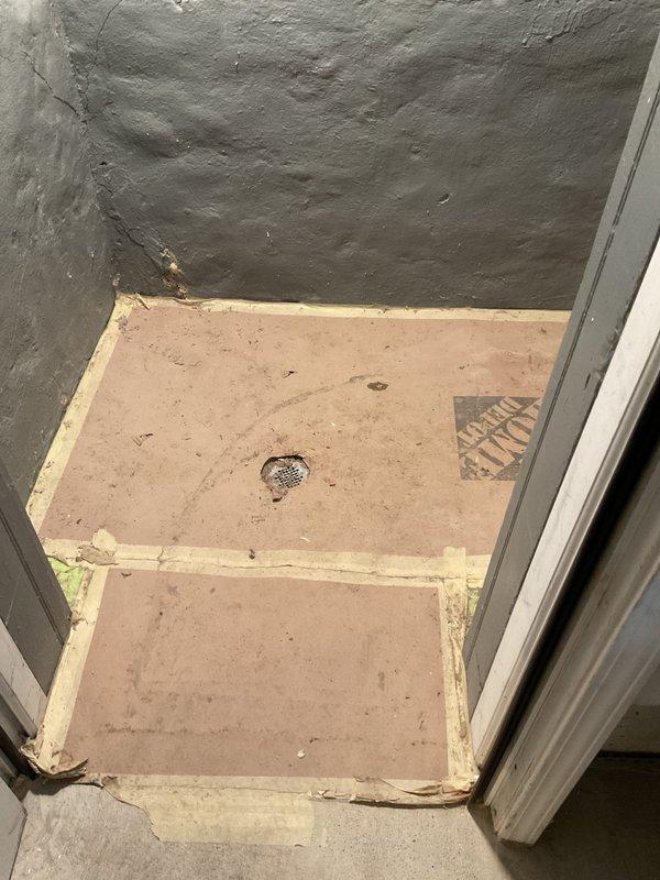 Responded to service request for recurring sewer backup in basement of 100-year-old home. Performed main line rodding to clear obstruction and conducted comprehensive video inspection of sewer system. Observed significant floor deterioration around basement drain and ongoing bathroom renovation work that may be contributing to drainage issues.