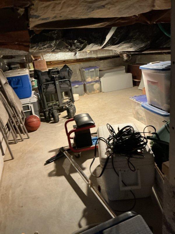 Conducted camera inspection of sewer line as requested by customer who reported previous backup issues during heavy rainfall. Examination revealed system had been recently rodded but identified potential obstructions that could cause future backups. Documented current condition of basement plumbing infrastructure including PVC drainage system with cleanout access for preventative maintenance recommendations.