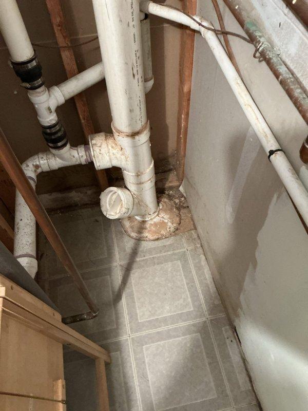 Conducted camera inspection of sewer line as requested by customer who reported previous backup issues during heavy rainfall. Examination revealed system had been recently rodded but identified potential obstructions that could cause future backups. Documented current condition of basement plumbing infrastructure including PVC drainage system with cleanout access for preventative maintenance recommendations.