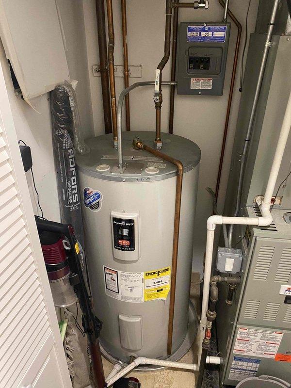 Identified and repaired a leak in the shower panel system of the primary bathroom that had been occurring for approximately ten days. Inspected the water heater and associated plumbing connections to verify proper water pressure and supply to the shower fixture was maintained after repair completion.