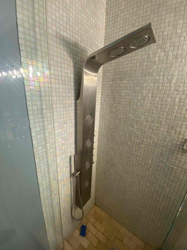 Identified and repaired a leak in the shower panel system of the primary bathroom that had been occurring for approximately ten days. Inspected the water heater and associated plumbing connections to verify proper water pressure and supply to the shower fixture was maintained after repair completion.