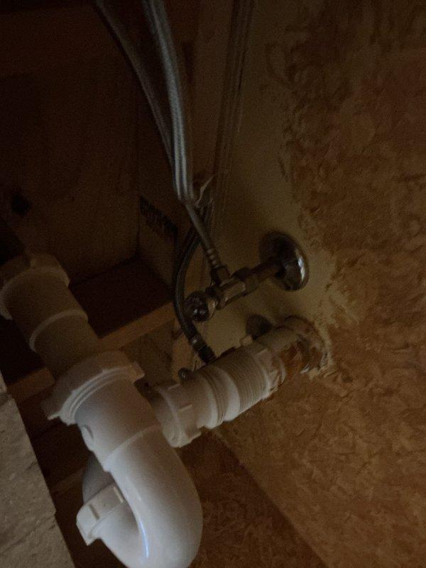 Responded to priority service call for slow draining bathroom sink and toilet. Inspected the Sani Compact Elite macerating toilet system and associated plumbing components. Cleared blockage in the drain assembly, restoring proper drainage function to both fixtures.