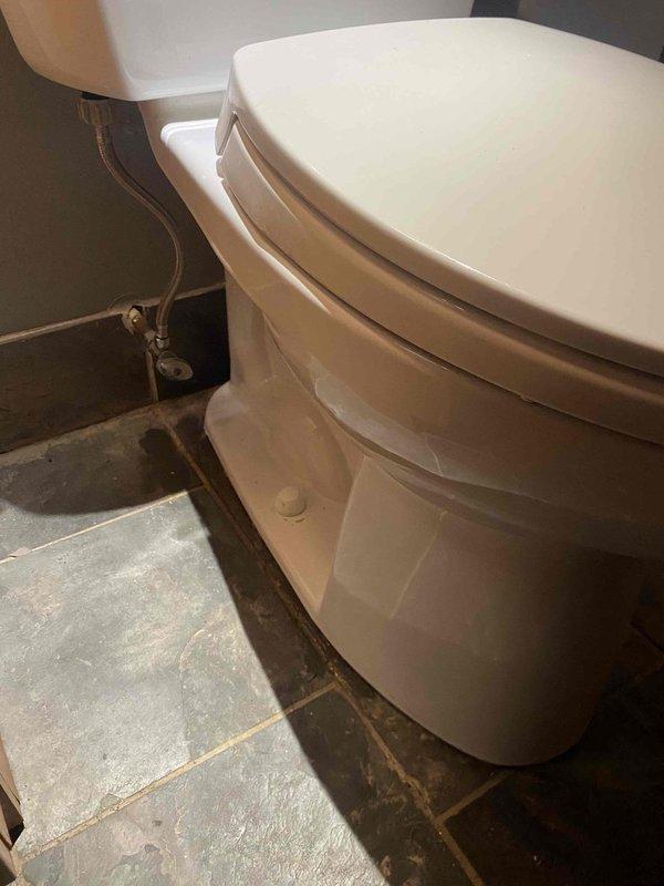 Removed and replaced deteriorated cast iron closet flange with new PVC closet flange securely installed within existing hub using lead pour method. Reinstalled customer's existing toilet with new wax ring and mounting bolts, ensuring proper seal and stable fixture mounting.