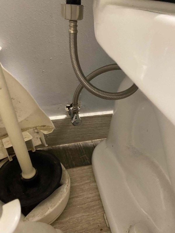 Investigated continuous water meter reading reported by city. Inspection revealed toilet tank components with mineral buildup, particularly affecting the flush valve and float mechanism. Examined and adjusted the toilet's water supply line and shut-off valve. Resolved the leak by reseating the flush valve and calibrating the float assembly to proper height, eliminating the continuous water flow.