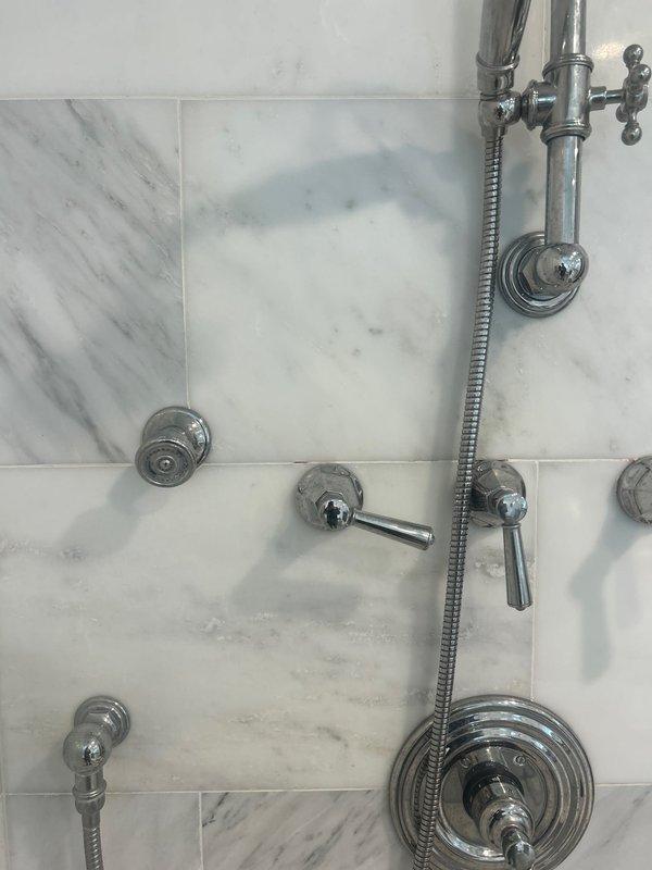 Responded to service call for multiple plumbing issues. Completed stem replacements on bathroom sink to address leak, performed courtesy handle adjustment on shower system to prevent leaking, and inspected 50-gallon water heater (installed 2016) per customer request. Customer approved all completed work.