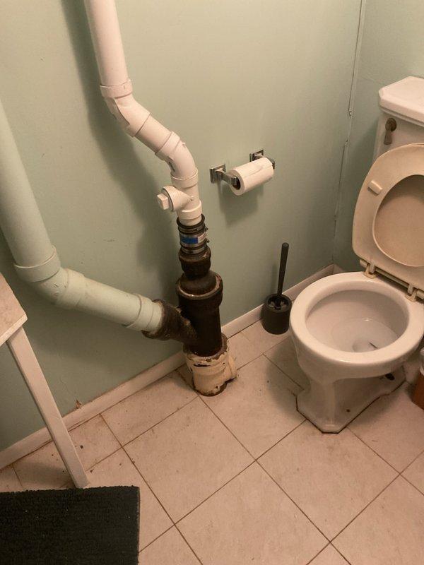 # Plumbing Estimate - Sump Pump

Responded to service call regarding malfunctioning sump pump monitoring system emitting audible alarm. Upon inspection, found dual sump pump system with electronic monitoring control unit installed in basement utility area. System was cycling between primary pump (pump 1) and secondary backup pump (pump 2) before shutting down, indicating potential float switch failure preventing proper pump activation.

Examined sump pit containing standing water with primary pump partially submerged. Assessed condition of monitoring system control box, electrical connections, and PVC discharge piping secured to wall. Observed signs of age and moisture exposure in mechanical room environment. Also noted corroded metal plumbing connections in adjacent bathroom area that may require future attention. Provided estimate for float switch replacement and system testing to restore proper sump pump operation and eliminate false alarm condition.