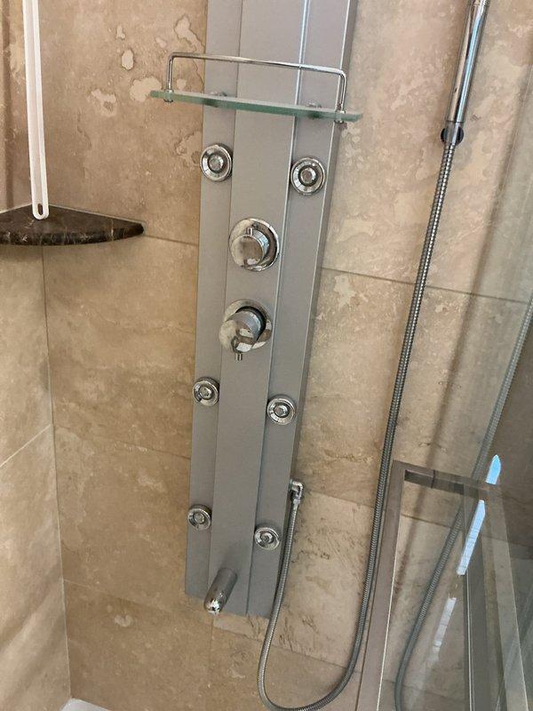 # VIP Plumbing Maintenance Service Summary

Completed scheduled VIP maintenance appointment including comprehensive flood control system inspection and maintenance. Serviced pressure regulator assembly with brass fittings and copper piping, performing system flush and testing procedures to ensure proper operation and pressure control. Conducted thorough inspection of multi-function vertical shower panel system with body spray jets and controls, verifying all components for proper operation and water delivery. All plumbing fixtures tested and confirmed functioning within normal parameters.
