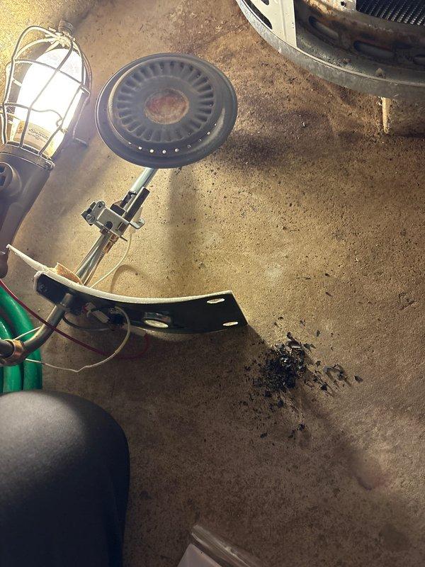 # Water Heater Inspection and Replacement Estimate

Conducted comprehensive inspection of residential gas water heater to assess operational condition and determine replacement necessity. Examined Honeywell gas control valve and thermostat assembly, evaluating temperature regulation functionality and pilot light operation. Inspected burner assembly at base of unit, noting accumulated debris and sediment buildup in combustion chamber. Assessed copper supply piping connections showing age-related discoloration and patina formation. Documented condition of gas control components, electrical connections, and manufacturer specifications via detailed photography. Based on inspection findings including compromised burner performance, potential control valve deterioration, and overall unit age, provided professional recommendation for complete water heater replacement to ensure safe and efficient operation.