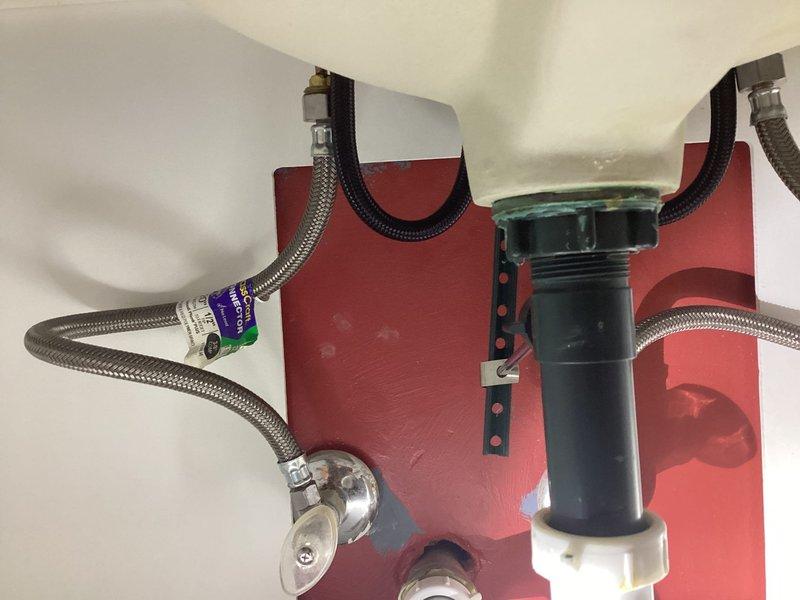 Responded to service call for leaky sink issue. Upon inspection, identified worn supply line connection causing water seepage beneath the kitchen sink. Replaced defective braided stainless steel supply lines connecting to both hot and cold water feeds. Verified proper installation of existing water filtration system and ensured all connections were secure and leak-free. Tested water flow at multiple pressure levels and confirmed no active leaks present at supply line connections, shut-off valves, or filtration unit. System restored to full operational status.