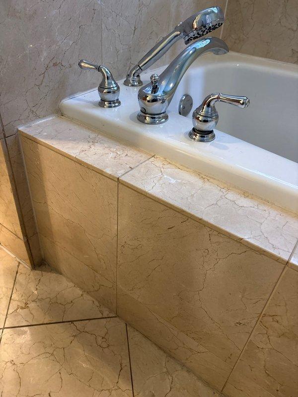 Responded to service call for pipe leak in ceiling above bathroom area. Upon inspection, located source of water leak affecting ceiling structure. Accessed plumbing lines running through ceiling cavity above jetted bathtub installation. Identified compromised pipe connection causing water seepage into ceiling materials. Performed necessary repairs to leaking pipe, tested water pressure and flow to verify integrity of repair. Confirmed no additional moisture intrusion and ensured all plumbing connections were properly sealed and functioning correctly.