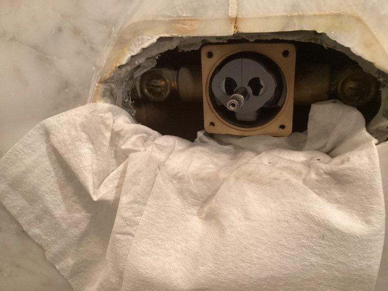 Responded to customer report of leaking shower faucet that began the previous day. Upon inspection, identified worn valve stem cartridge and deteriorated internal seals as the source of the leak. Removed existing trim plate and faceplate, extracted the faulty cartridge assembly, and replaced with new OEM-compatible valve stem and seal kit. Reinstalled mounting hardware and trim components, ensuring proper alignment and secure attachment to wall substrate. Tested water flow and temperature control through multiple cycles to verify complete elimination of leak and proper valve operation.