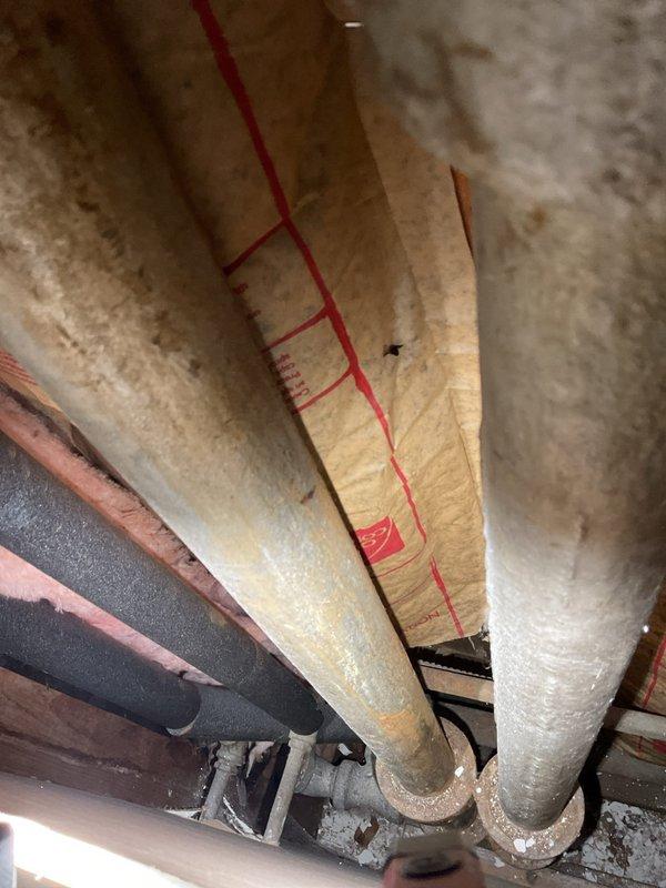 Responded to emergency drain backup affecting multiple fixtures across three floors. Upon inspection, found water and black debris backing up through basement bathroom sink and shower, with backflow occurring in upper floor sink when plunger was applied, indicating main drain line obstruction. Successfully cleared blockage in primary drain line, restoring proper drainage flow throughout all affected fixtures. Verified system operation and confirmed no further backflow issues.