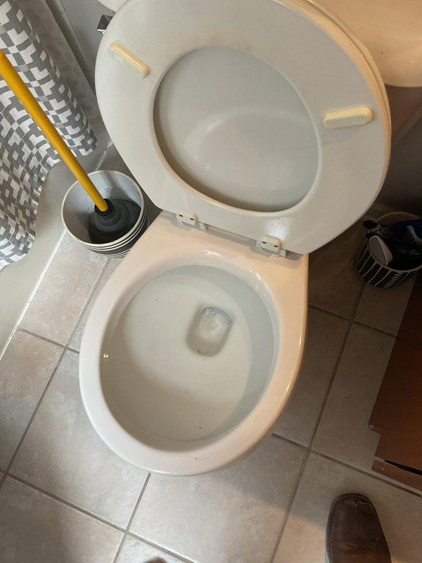 Responded to service call for toilet backing up and failing to flush completely. Upon arrival, inspected toilet bowl and drainage system. Performed diagnostic assessment to identify blockage in waste line preventing proper flushing action. Cleared obstruction using appropriate plumbing tools and techniques. Tested flush mechanism multiple times to verify proper water flow and complete drainage. Confirmed toilet now operating normally with full flush capacity restored and no backup issues remaining.