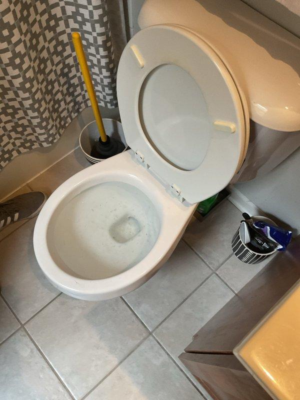 Responded to service call for toilet backing up and failing to flush completely. Upon arrival, inspected toilet bowl and drainage system. Performed diagnostic assessment to identify blockage in waste line preventing proper flushing action. Cleared obstruction using appropriate plumbing tools and techniques. Tested flush mechanism multiple times to verify proper water flow and complete drainage. Confirmed toilet now operating normally with full flush capacity restored and no backup issues remaining.
