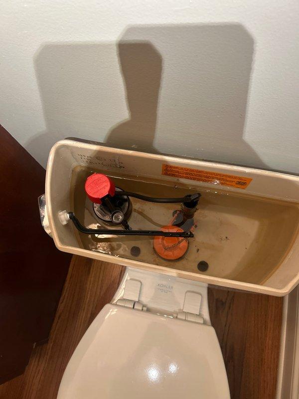 Responded to repair request for slow leak from toilet water supply line and slow tank refill issue. Upon inspection, identified compromised braided metal supply hose with brass fittings showing signs of deterioration at connection points. Removed tank lid to assess internal flush mechanism and diagnosed worn flapper valve and fill valve assembly requiring attention. Replaced defective water supply line with new flexible braided stainless steel connector, ensuring proper seal at wall shutoff valve and toilet tank inlet. Serviced fill valve assembly to restore proper flow rate and adjusted float mechanism to correct water level. Installed new flapper valve and chain assembly to ensure complete seal and prevent water waste. Tested system through multiple flush cycles to verify proper refill speed and confirm elimination of supply line leak. All components functioning to manufacturer specifications upon completion.