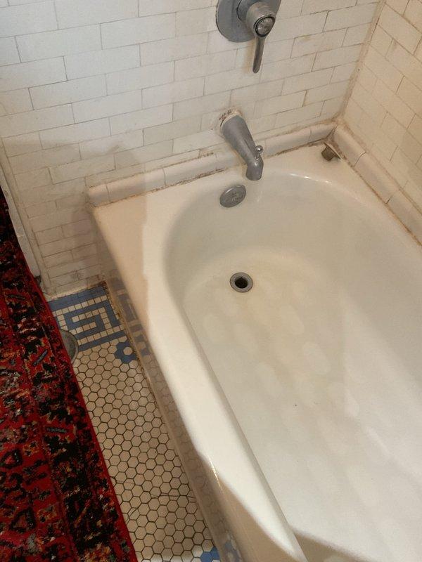 Responded to multiple slow-draining fixtures including three bathrooms, a basement utility sink, and toilet experiencing backup issues with black water surfacing in the bathtub. Performed rodding service on all affected drains to clear blockages and restore proper drainage throughout the plumbing system.