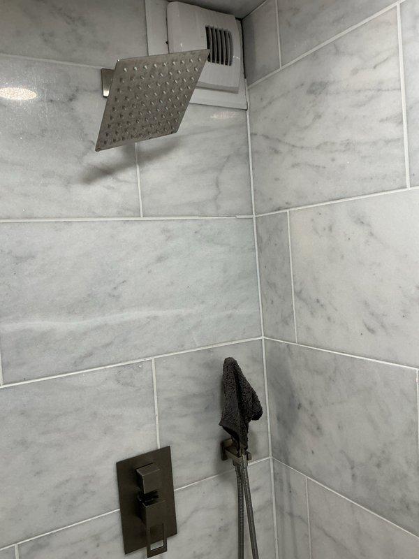 Responded to service call for water temperature control issue in shower. Upon inspection, identified faulty shower valve and compromised shower kit requiring replacement. Existing valve mechanism showed signs of wear affecting temperature regulation. Recommended complete shower valve and trim kit replacement to restore proper hot/cold water mixing and temperature control functionality.