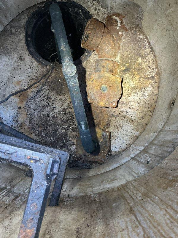 Responded to basement flooding caused by recent storm conditions. Removed and replaced heavily corroded sump pump system that had failed due to extensive rust degradation and age-related deterioration. Installed new flood control system including updated sump pump basin, PVC discharge piping, and proper electrical connections to prevent future water intrusion and protect stored items including musical instruments and household belongings from water damage.