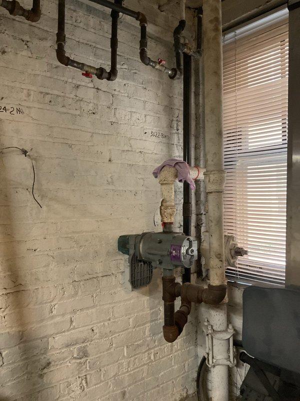 Responded to request for oven gas line inspection in 100-year-old residential property. Upon arrival, located kitchen oven and traced gas supply line to basement utility area. Performed comprehensive visual inspection of gas piping system, including flex connector at appliance termination point and rigid piping throughout supply route. Examined all joints, fittings, and connections for signs of deterioration, corrosion, or compromise. Noted age-appropriate wear on metal piping components with surface oxidation present on steel sections. Applied leak detection solution at all connection points and monitored for bubble formation indicating gas escape. Verified proper support and securing of gas lines per code requirements. Inspected flexible gas connector at oven for cracks, kinks, or damage to corrugated stainless steel tubing. Checked clearances from electrical components and verified proper routing away from heat sources. Examined shut-off valve operation and accessibility. Documented