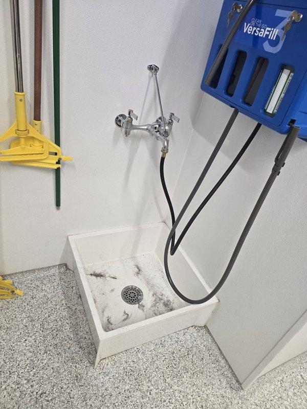 Returned to complete previously sold plumbing repair work in kitchenette and utility sink areas. Successfully installed new chrome pull-down faucet at kitchen sink and wall-mount faucet with dual handles at utility basin, ensuring proper water flow and secure mounting. All installations tested and verified operational.