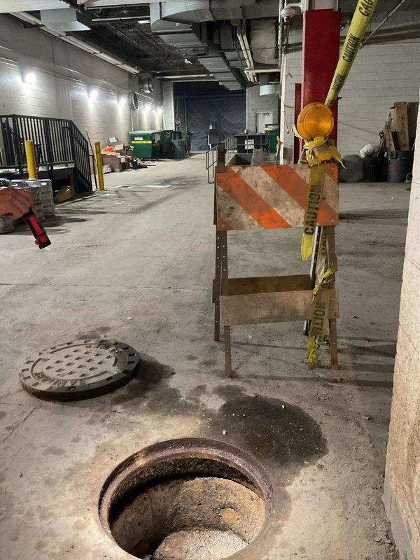 Responded to main line rodding call at commercial facility, accessing the system through the back dock entrance. Upon arrival, located the main line cleanout access points in the basement level near the loading area. Removed the cleanout cover to expose the main drainage line and performed rodding procedure to clear the blockage. Successfully cleared the obstruction in the main sewer line and restored proper drainage flow. Secured the work area with safety barriers during the service and replaced all access covers upon completion.