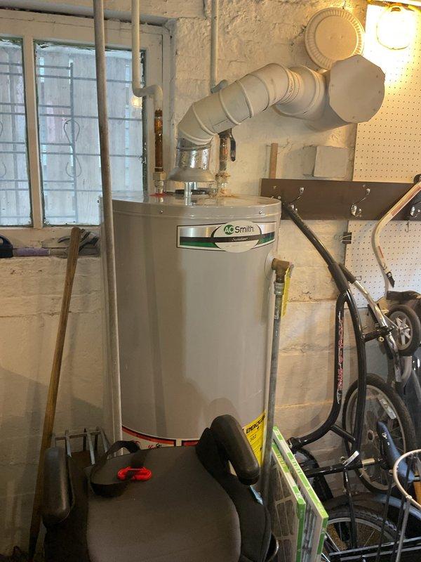 Responded to service call for sewer drain clearing and jetting evaluation. Conducted on-site assessment to locate and evaluate cleanout access points for hydro-jetting services. Informed customer that jetting work would require scheduling for a future appointment, and today's visit was strictly for evaluation and estimate purposes. Documented existing plumbing configuration and water heater location in basement utility area to determine optimal access route for future drain clearing procedures.