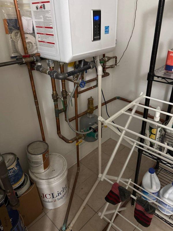Performed routine maintenance on residential sump pump system, including inspection of discharge piping, check valve operation, and float switch functionality. Verified proper drainage flow through PVC discharge lines and confirmed all plumbing connections were secure with no signs of leakage or corrosion.