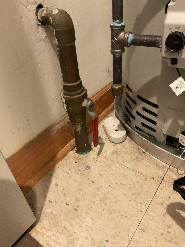 Responded to low water pressure complaint affecting entire home, particularly noticeable when washing machine operates. Issue began following recent water heater installation. Upon inspection, identified pressure regulation concerns related to the new water heater installation. Examined plumbing configuration in utility room, including copper piping assembly and connections to ensure proper flow capacity and verified system was functioning correctly to restore adequate water pressure throughout the residence.