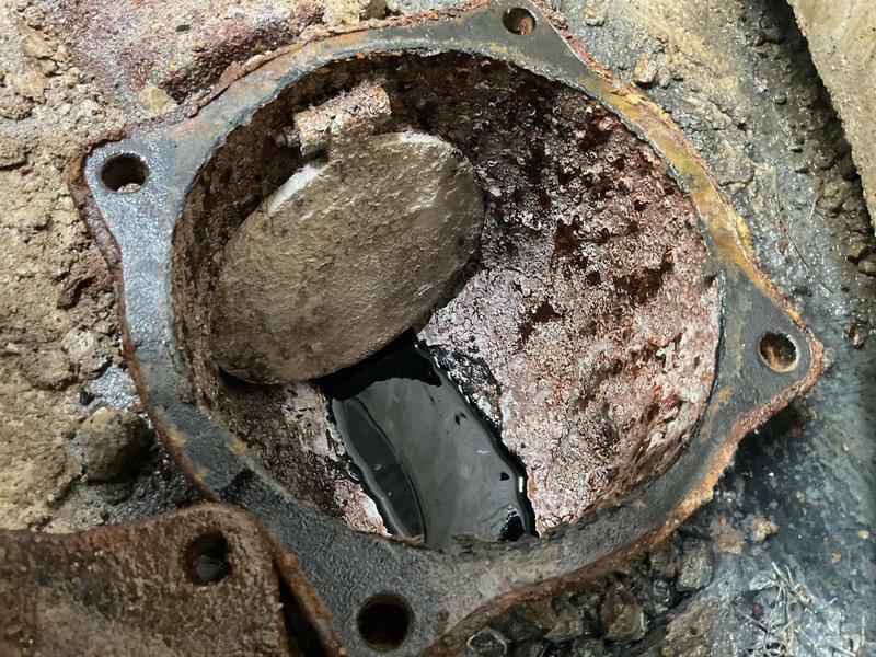 Performed comprehensive flood control system inspection and assessment. Upon examination, discovered severe corrosion and deterioration of the sump pump assembly, including heavily oxidized housing, flange, and mounting components. The impeller showed significant mineral deposits and calcification, indicating prolonged exposure to moisture and compromised operational efficiency. Disassembled corroded hardware and documented the extent of damage to all mechanical components. Recommended complete pump replacement due to the advanced state of deterioration that poses risk of system failure during flood conditions.