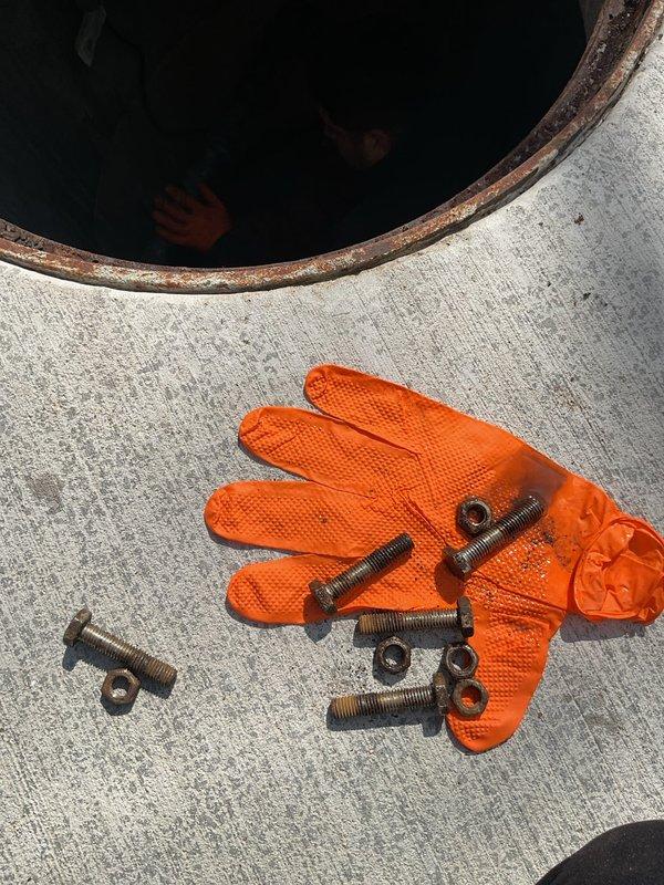 Performed comprehensive flood control system inspection and assessment. Upon examination, discovered severe corrosion and deterioration of the sump pump assembly, including heavily oxidized housing, flange, and mounting components. The impeller showed significant mineral deposits and calcification, indicating prolonged exposure to moisture and compromised operational efficiency. Disassembled corroded hardware and documented the extent of damage to all mechanical components. Recommended complete pump replacement due to the advanced state of deterioration that poses risk of system failure during flood conditions.