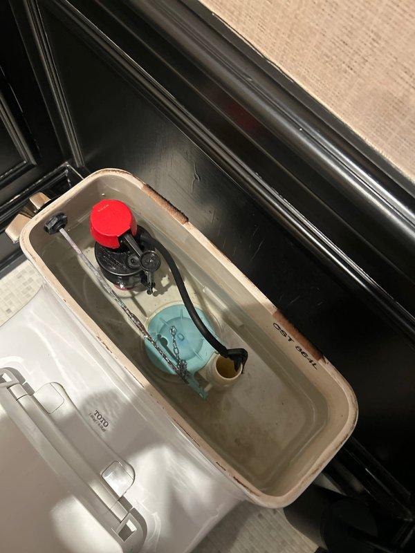 Completed comprehensive bathroom plumbing repairs including rebuilding two tub faucets with new cartridges, replacing deteriorated p-trap assembly, and rodding the tub/shower drain line to restore proper drainage. Performed level one diagnostic assessment of plumbing fixtures and identified worn internal flush valve components requiring attention. All faucet assemblies were disassembled, cleaned, and rebuilt with manufacturer-specified replacement cartridges to eliminate leaks and restore proper water flow control. The corroded p-trap was removed and replaced with new assembly to prevent future leaks and maintain proper drainage seal. Successfully cleared tub/shower line obstruction using mechanical rodding equipment.
