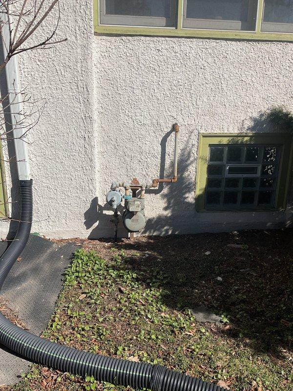 Responded to service call for non-functional ejector pump system in basement utility area. Upon inspection, confirmed existing ejector pump had failed and required complete replacement. Assessed the current installation including white PVC discharge piping assembly with shut-off valve, multiple elbow connections, and floor penetration boot. Provided detailed estimate for ejector pump replacement including removal of failed unit, installation of new ejector pump with appropriate basin, reconnection of existing PVC discharge piping system, and verification of proper operation upon completion.