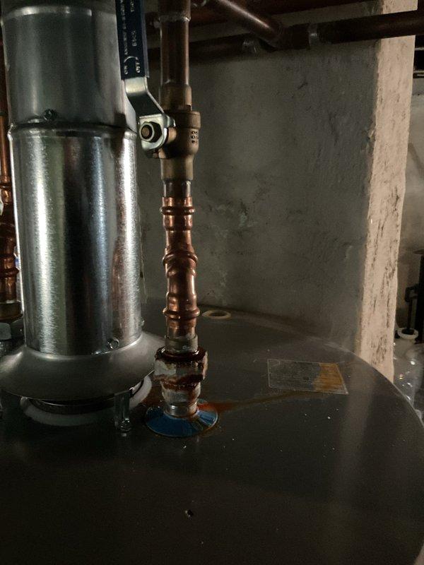 Responded to service call to replace copper fitting on water heater intake line that was recently installed by another contractor. Successfully removed existing copper fitting and installed new copper connection at the cold water inlet on top of the water heater tank, ensuring proper seal and alignment with existing plumbing system. Verified all connections were secure and tested system for leaks upon completion.