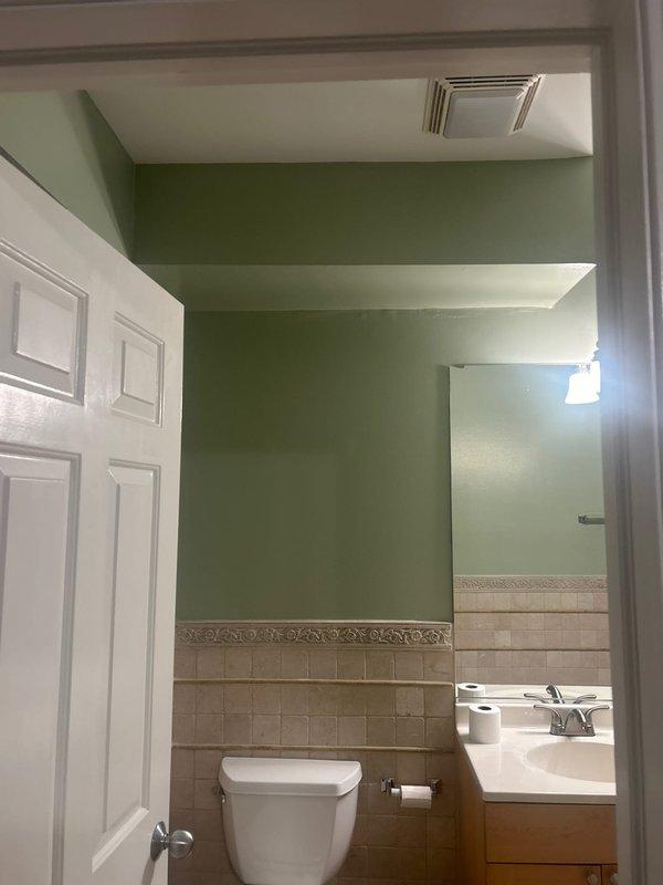Responded to customer report of knocking sounds in plumbing pipes when water supply is shut off. Conducted diagnostic assessment of water heater system to determine whether repair or replacement would be necessary. Documented existing bathroom conditions and plumbing fixtures with photographic evidence for estimate preparation.