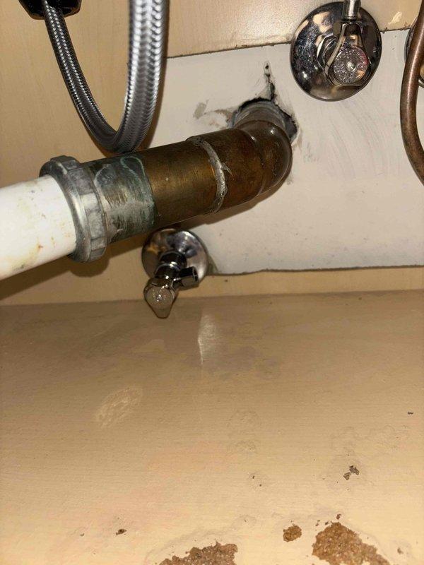 Responded to morning appointment for dishwasher continuously filling with water despite water supply being shut off. Diagnosed faulty inlet valve allowing water to bypass shutoff position. Replaced defective dishwasher inlet valve assembly to resolve unauthorized water flow issue. Additionally, replaced worn pop-up drain stopper assembly in pedestal sink as requested. Inspected under-sink plumbing during service call and noted significant corrosion on brass trap fitting, which was documented with photographs for future maintenance consideration. All work completed and tested for proper operation before departure.