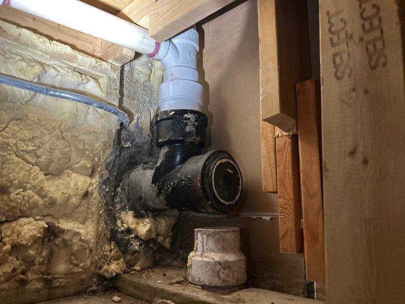 Responded to emergency service call for ejector pump running continuously since morning. Upon arrival, inspected the ejector pump system in basement utility area and identified mechanical failure preventing proper cycle operation. Evaluated existing plumbing configuration including black iron pipe fittings, PVC discharge piping, and pump assembly connections. Documented condition of pump system components, check valve operation, and electrical connections. Provided detailed estimate for ejector pump replacement including removal of failed unit, installation of new pump with appropriate check valve and discharge piping modifications, and testing of complete system to ensure proper float switch operation and automatic cycling functionality.