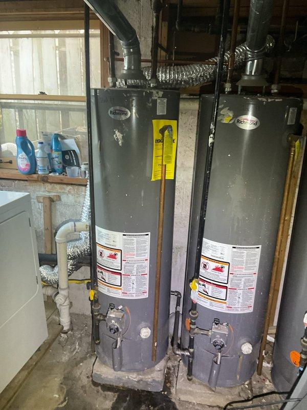 Conducted comprehensive assessment of existing water heating system in basement mechanical room featuring multiple Richmond brand water heaters. Documented current installation configuration including all plumbing connections, venting systems, and equipment specifications. Photographed water heater units, associated piping infrastructure, flexible metal ductwork, and surrounding utility area to support estimate preparation. Identified equipment specifications and operational components for replacement planning. Coordinated follow-up communication with quality assurance specialist to finalize estimate recommendations for customer review.