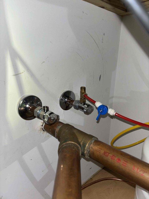Replaced reverse osmosis faucet on existing RO system located adjacent to kitchen sink in 2006-built home. Disconnected old faucet assembly, installed new faucet with proper connections to RO system supply lines, verified all connections were leak-free, and tested system operation to ensure proper water flow and functionality.